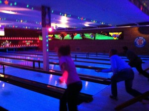 girl and uncle bowling