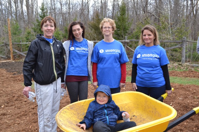 Union gas volunteers planting trees