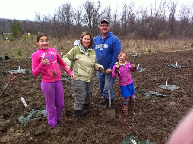 Swinton family planting trees