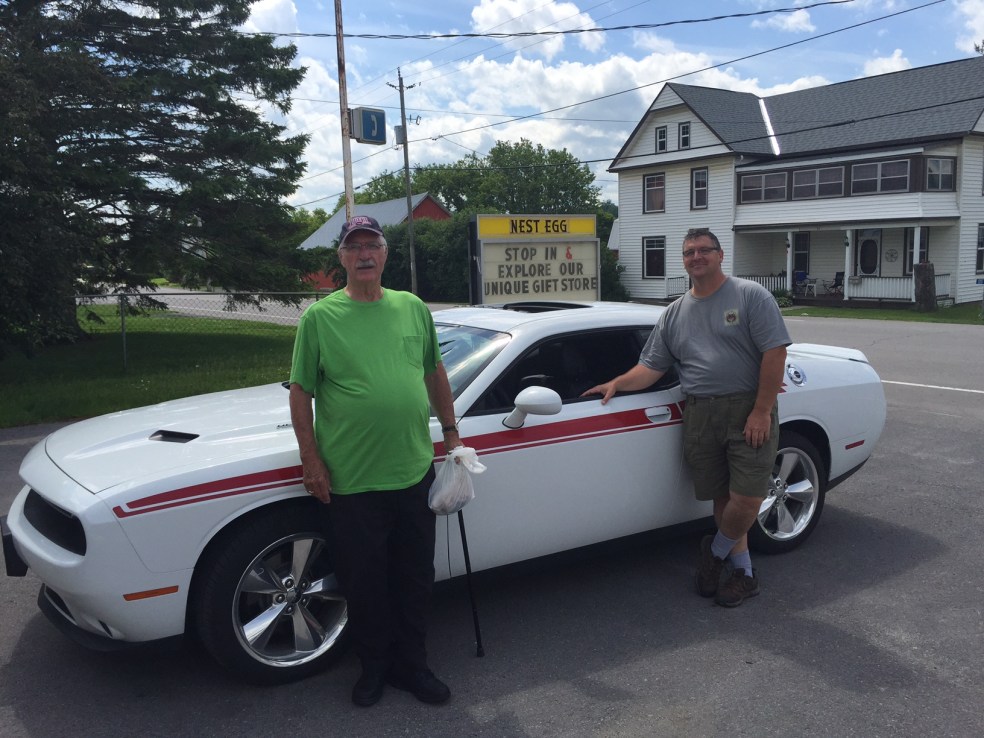 Two men and a sports car