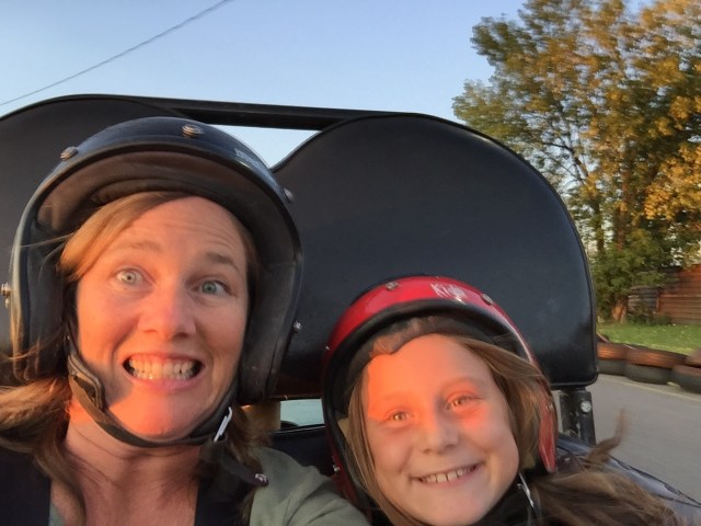 Mom and girl in a go-kart