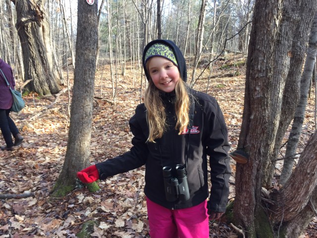 girl holding bird seed