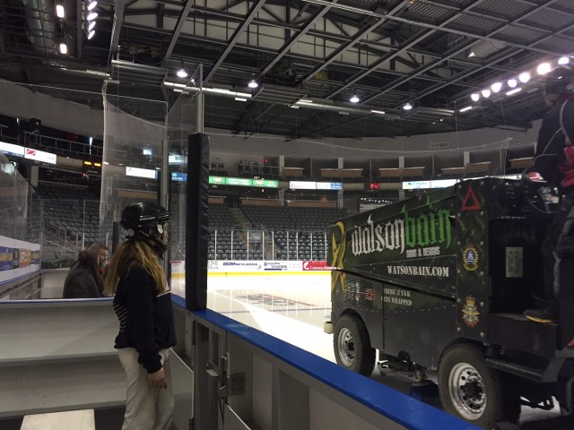 girl watching zamboni