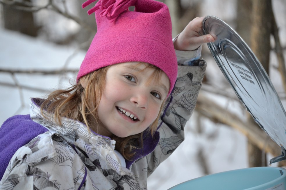 Girl with sap bucket