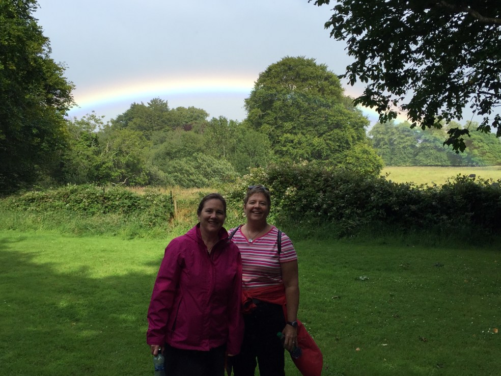 Two women and a rainbow