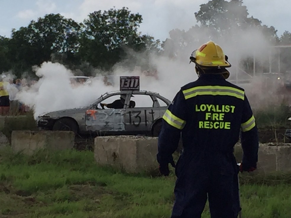 fire crew at demolition derby on stand by