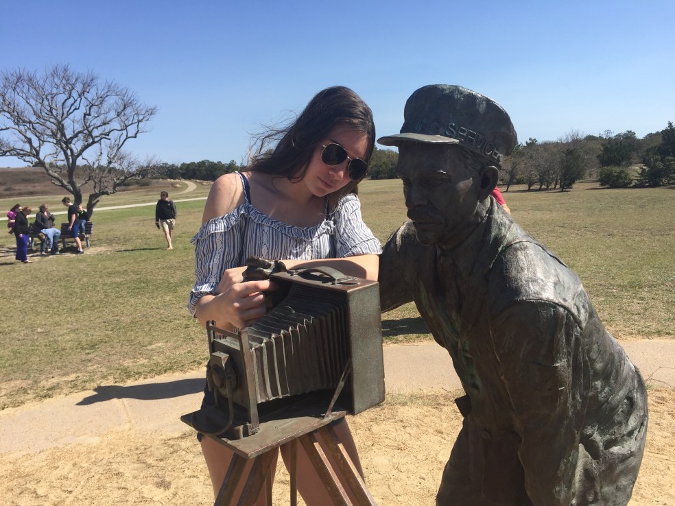 Girl at Kitty Hawk statue