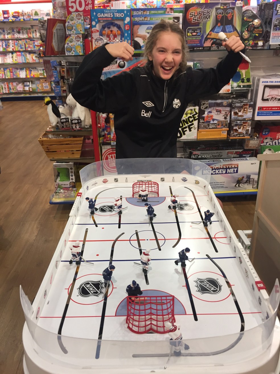 Girl and hockey game