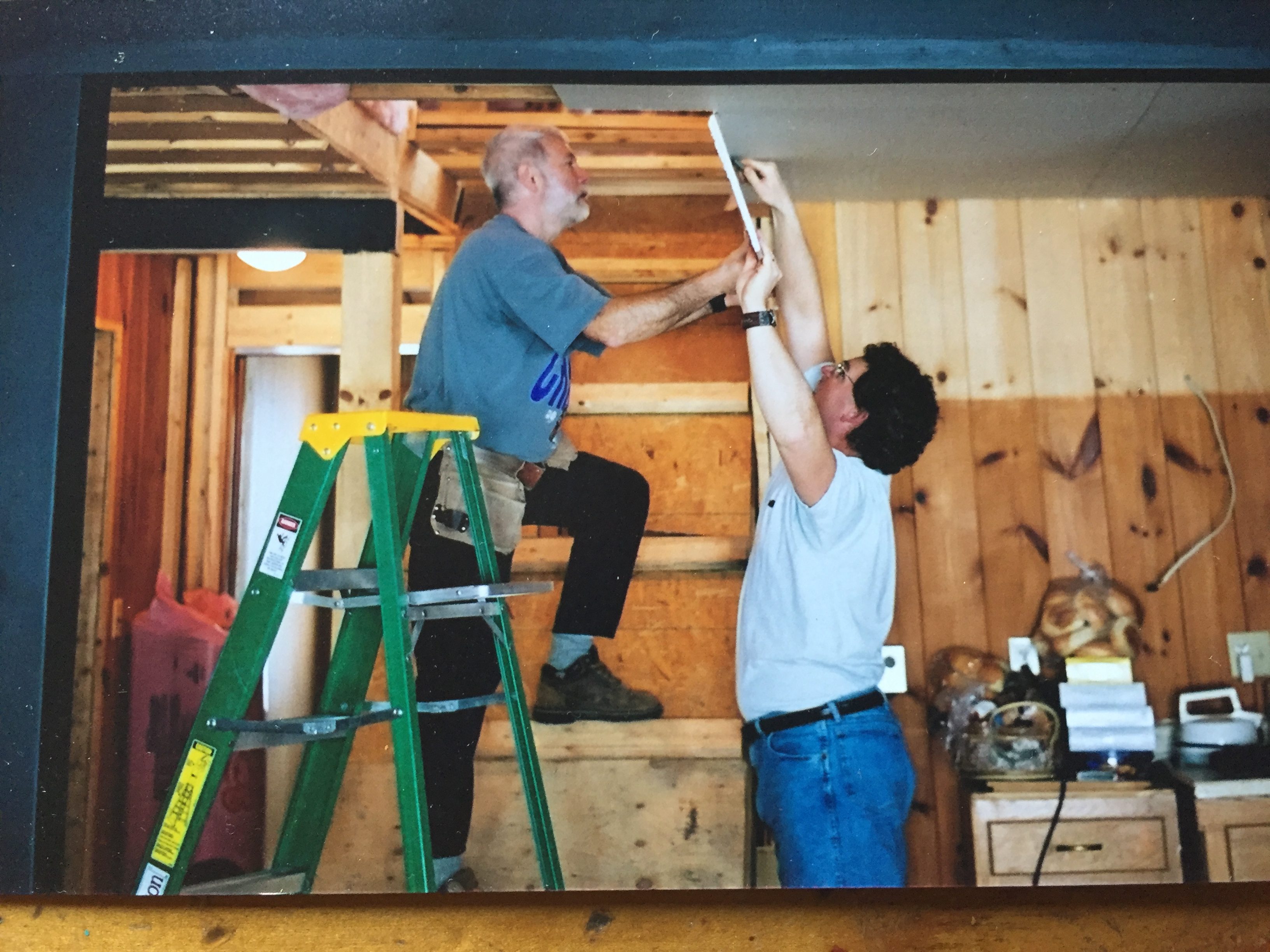 Jack and Dave putting up drywall