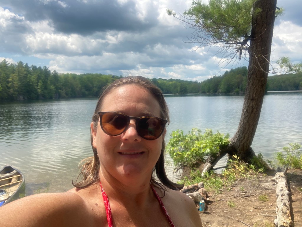 Author on island with a canoe