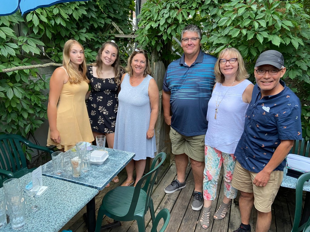 Family and friends at the Amadeus patio in Kingston