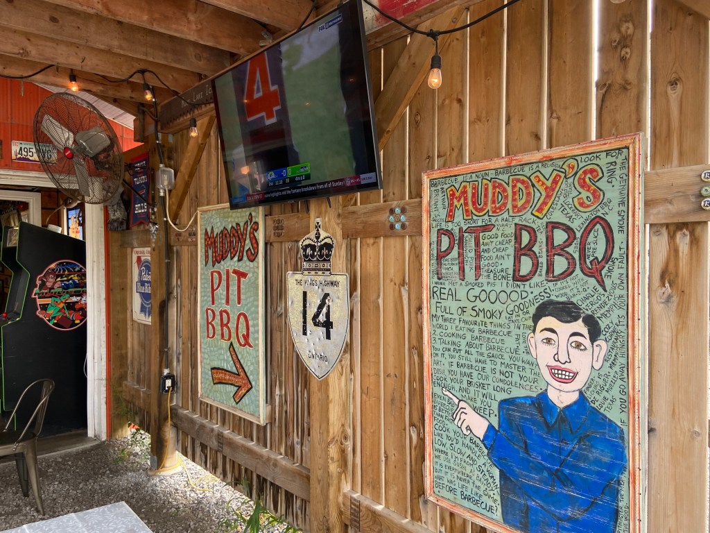 Muddy's BBQ pit sign