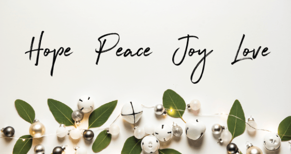 Sign with words hope, peace, joy and love