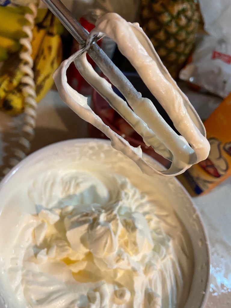 Whipped cream on a beater