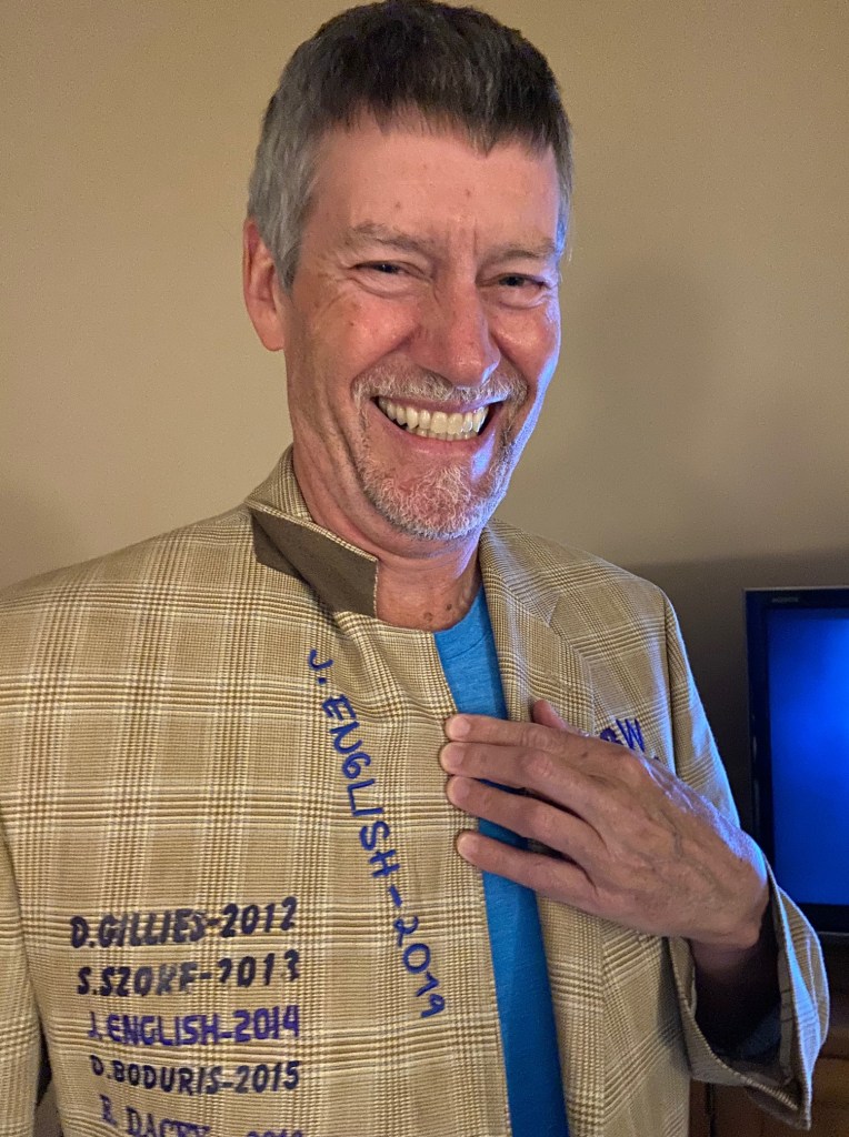 Lapel of jacket with name embroidered on the inside