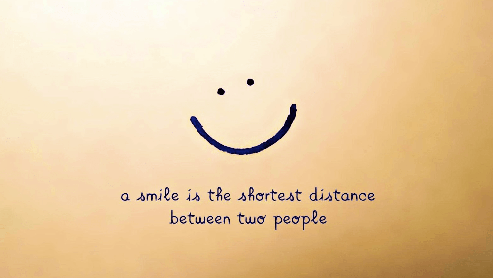 smile and saying "a smile is the shortest distance between two people"