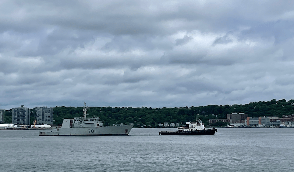 Navy ship and a barge in Halifax harbour